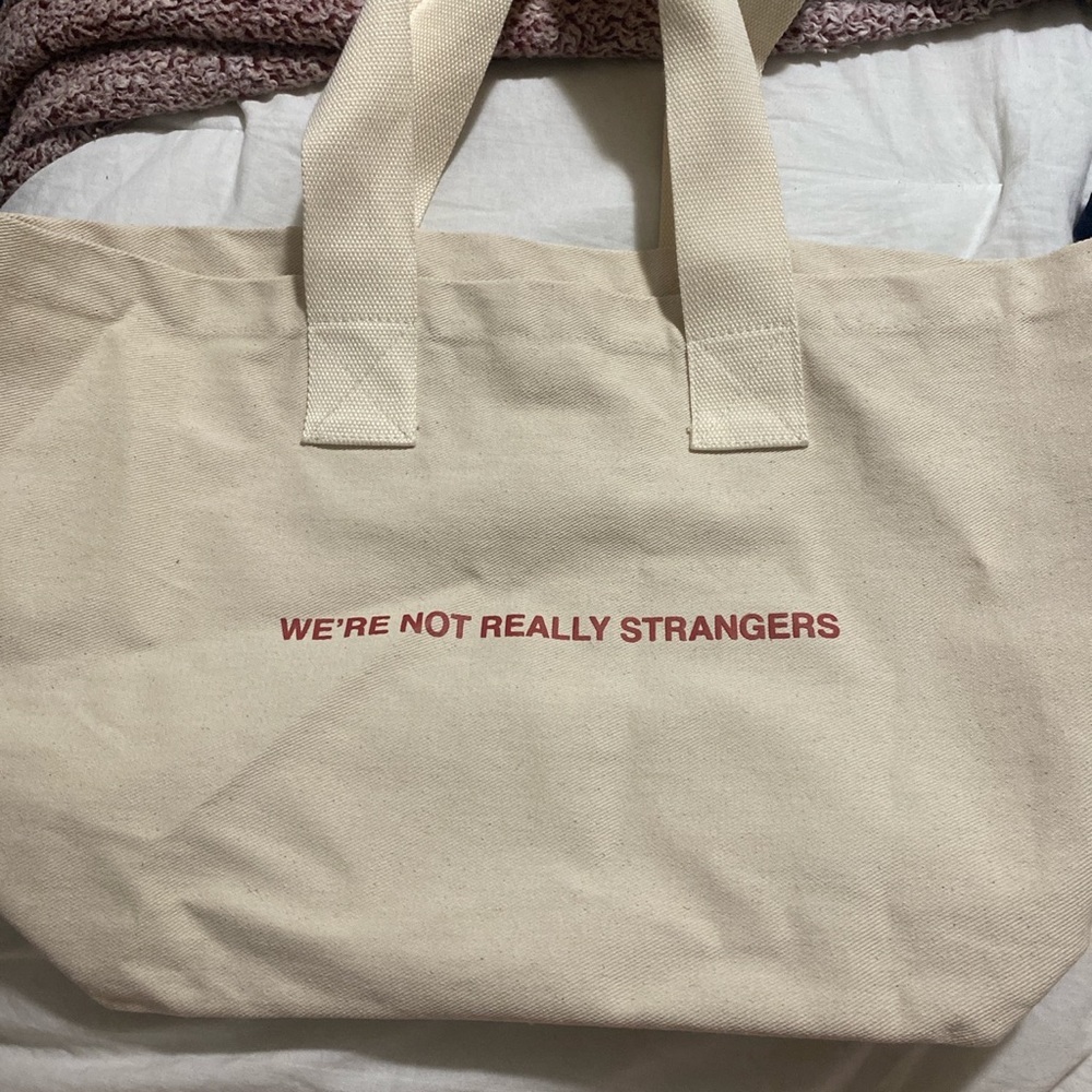We’re Not Really Strangers tote bag